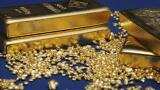 Gold climbs back towards 17-month peak as dollar slips