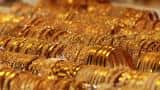 Gold price in India: Yellow metal tumbles as global value sink on stronger dollar