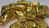 Gold hits one-week high on dollar weakness, geopolitical tensions