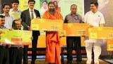 Ramdev launches Patanjali SIM card in tie-up with BSNL; Check out photos 