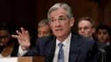 US Federal Reserve lifts rates amid stronger inflation, hints at more hikes in 2018
