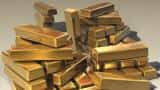 Gold prices inch up as trade row triggers safe-haven buying