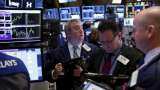Wall Street settles lower as fall in Amazon, Intel share prices add to trade jitters Wall Street settles lower as fall in Amazon, Intel share prices add to trade jitters