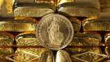 Gold prices recover from 6-month low as dollar drops; Russia buys bullion Gold prices recover from 6-month low as dollar drops; Russia buys bullion