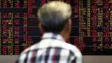 Asian markets hobbled by trade fears, oil prices extend gains
