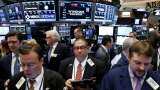 Dips in Facebook and Apple shares leave Wall Street lower Dips in Facebook and Apple shares leave Wall Street lower