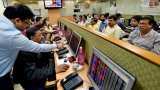 Sensex, Nifty settle lower; rupee breaches 69-mark again