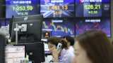 Asian markets cautious ahead of central bank, data fest