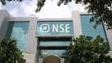 Sensex eases from record highs; financials drag