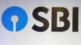 SBI posts third straight quarterly loss, bad loan ratio improves