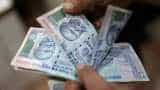 Rupee again breaches 72-mark, down 81 paise in early trade