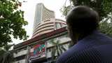 Nifty, Sensex edge lower as new import tariffs set in; financials drag