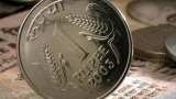  Rupee drops 20 paise to close at 73.47 against US dollar