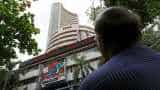 Sensex falls 300 points on weak global cues