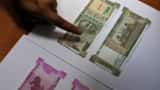 Rupee falls 27 paise to 69.70 against US dollar in early trade