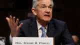Wall Street roars back on robust jobs report, dovish Powell remarks