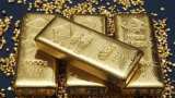 Gold falls Rs 450 on weak global cues, tepid demand
