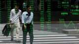 Asian shares tread water amid mixed growth signals