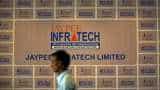 Jaypee Infra buyout race picks up with Adani, NBCC bids Jaypee Infra buyout race picks up with Adani, NBCC bids