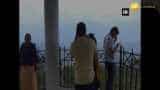Tourists enjoy breathtaking view of Shillong Peak surrounded by clouds
