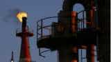 Global oil price rises 1 pct on a drawdown in US crude stockpiles, US-Chinese trade tension still looms