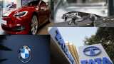 Has Tesla got a new rival? Luxury carmakers BMW, JLR join hands for EVs - Should you buy Tata Motors share? 
