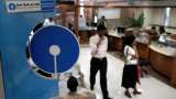 Buy SBI shares on dips, says expert after India&#039;s biggest lender logs  Rs 2,312 crore net profit in Q1