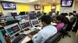 Sensex, Nifty open on flat note amid weak global cues; SpiceJet, Power Grid, Marico, Titan major gainers  