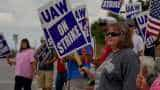 GM appeals directly to employees as strike losses mount