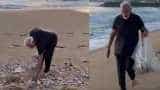 INSPIRATIONAL VIRAL VIDEO: When PM Narendra Modi collected garbage thrown on beach - WATCH INSPIRATIONAL VIRAL VIDEO: When PM Narendra Modi collected garbage thrown on beach - WATCH