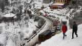 Weather today: Hills overlooking Manali, Himachal Pradesh wrapped in snow