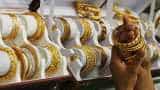 Gold prices fall as easing trade worries lead to riskier bets