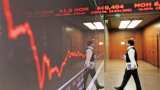 Global Markets: Asian stocks ride Wall Street momentum to 17-month peak, pound slips