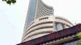 Sensex, Nifty trade cautious; Indian Overseas Bank, KEC International, Vedanta stocks gain