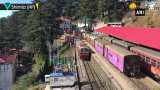 Tourists enjoy panoramic view of mountains in Vistadome train on Kalka-Shimla route Tourists enjoy panoramic view of mountains in Vistadome train on Kalka-Shimla route