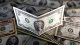 Dollar starts new year with a hangover as others find cheer