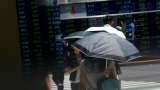 Global Markets: Asian stocks nudge up as virus spread slows, euro fragile
