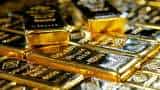 Gold gains as dollar weakens, fears of economic damage mount