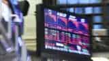 US stocks post weekly losses amid grim data, Fed comments
