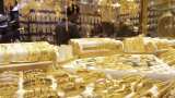 Gold prices decline by Rs 380 on subdued global cues 