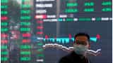 Asian shares mixed as corporate earnings loom