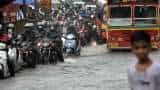 Mumbai rains update: Heavy rains batter city; trains, road traffic affected