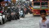 Mumbai rains update: Heavy rains batter city; trains, road traffic affected Mumbai rains update: Heavy rains batter city; trains, road traffic affected