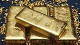 Gold futures ease on low demand