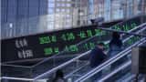 Asian shares edge lower but stimulus, vaccine hopes provide support