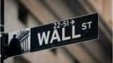 Wall Street climbs to record as fiscal aid bill signed