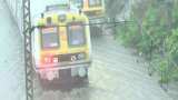 Mumbai Rains: Severe waterlogging; trains, local on these routes, stations affected - Check details Mumbai Rains: Severe waterlogging; trains, local on these routes, stations affected - Check details