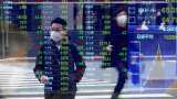 Asian markets fight for footing as investors fret over Evergrande crisis Asian markets fight for footing as investors fret over Evergrande crisis