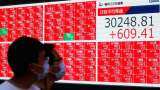 Asian shares stumble as U.S. yields, dollar hold firm