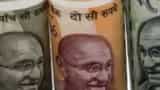 Rupee slumps 19 paise to over six-week low of 74.31 against USD Rupee slumps 19 paise to over six-week low of 74.31 against USD